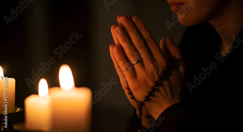 Praying Hands in Warm Candlelight