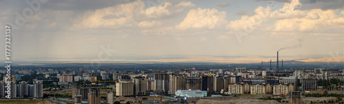 Panorama of Bishkek, Kyrgyzstan at cloudy summer day.