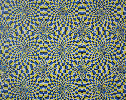 optical illusion artwork featuring concentric circular patterns in vivid blue, yellow, and white. The hypnotic spinning design creates a dynamic sense of motion and depth, ideal for backgrounds.