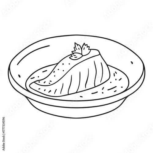 Deep plate containing fish coated in herbal marinade