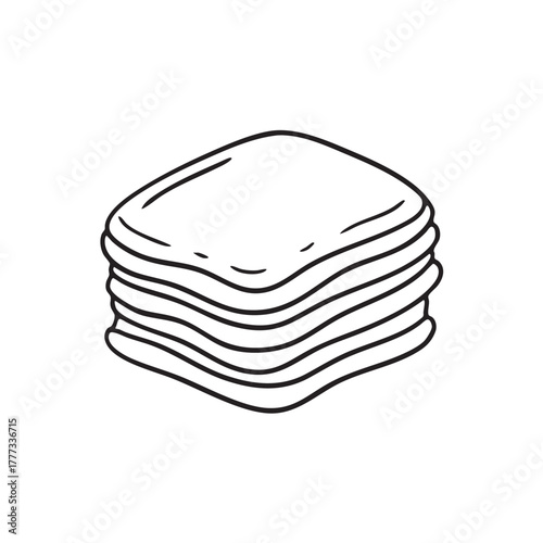 Stack of rolled thin dough squares piled together