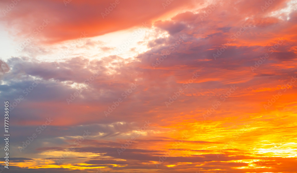 Obraz premium Sky sunset evening sunrise cloud weather dramatic landscape goldent and indigo color gradient pastel horizon, twilight yellow golden reflection morning nature environment energy ecosystem.