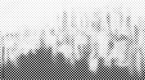 Halftone gradient of black circles on white creates an abstract, textured pattern, with the dots increasing in size towards the bottom, forming organic shapes and a dynamic visual effect