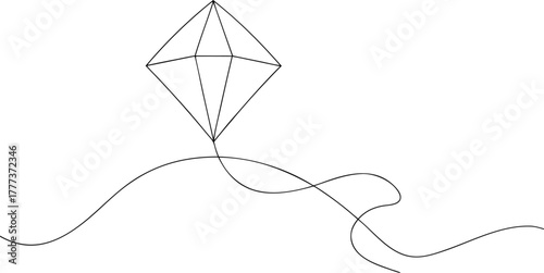 Diamond shaped kite with flowing string flying