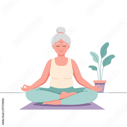 Elderly woman practicing yoga meditation indoors with houseplant  