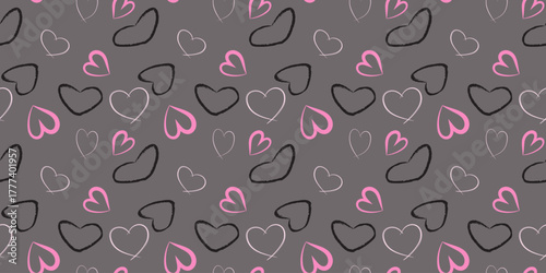 Cute and casual seamless vector pattern of sketchy hand drawn hearts in pink, white, and black on grey background, perfect for romantic gift wrap or Valentine's Day textile print.