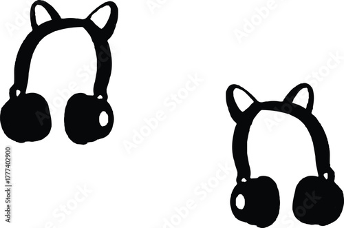 The image features two black headphone   Each , plush covering that provides warmth and comfort for the ears,,