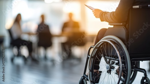 Business professional in wheelchair at corporate meeting with colleagues in modern office, highlighting workplace diversity, inclusion, accessibility, and equal opportunity for empowerment concept