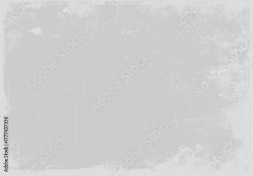 Faded distressed concrete texture with subtle scratches and speckles in light gray background grunge