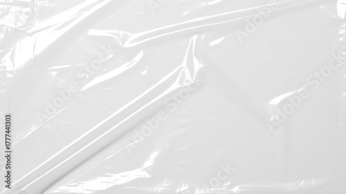 plastic overlay texture of realistic crumpled transparent plastic film wrap on black background,wrinkled stretched plastic effect.	