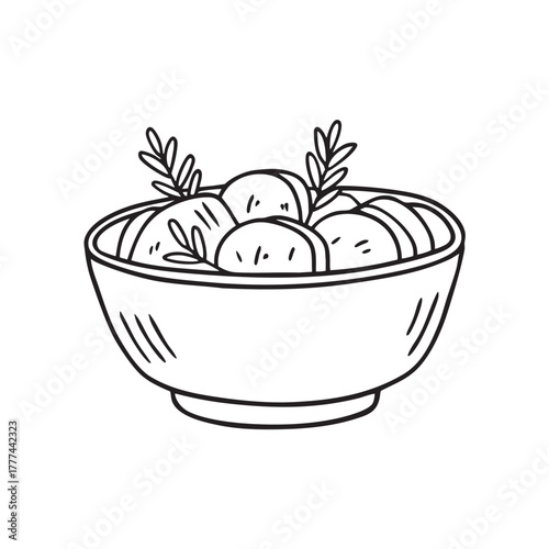 Bowl of roasted vegetables seasoned generously with herbs