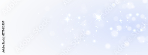 Shiny starlight dust trail glowing softly with magic golden sparkle background.
