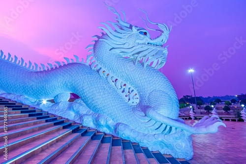 Traditional Naga sculptures along Wat Huai Pla Kang Temple steps, Chiang Rai, Thailand