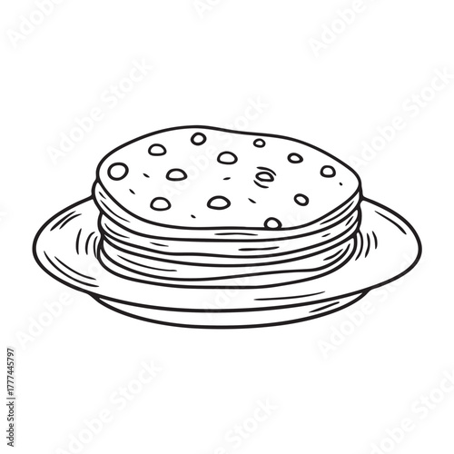 Metal plate holding delicate pancakes covered with tiny holes
