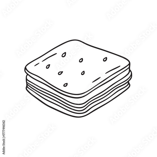 Stacked thin dough squares rolled and layered together