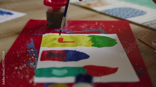 Vibrant painting process close-up unfolds with brush strokes on paper, showcasing artistic creativity and color blending