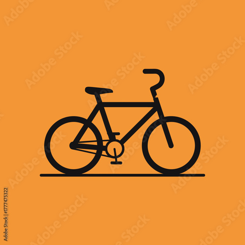 Silhouette of a bicycle on a flat surface.