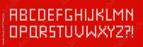 Christmas sweater font, alphabet with knitting pattern. Red wool jumper texture with white type. Woolen knitwear background with font for winter ugly sweater, vector illustration