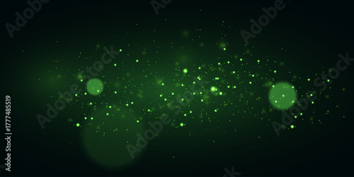 Green glowing particles on dark background