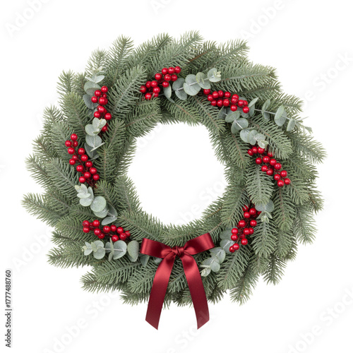 A beautifully handcrafted christmas wreath, adorned with deep green fir branches, eucalyptus leaves, and clusters of red berries, elegantly tied with a burgundy ribbon, isolated on a plain background 