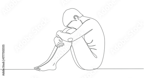 A figure sits hunched over with knees pulled to chest, conveying isolation.