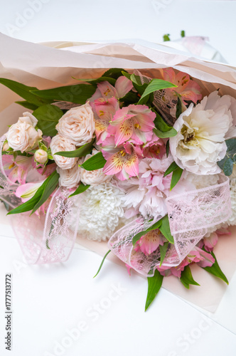 Large beautiful bouquet of mixed flowers in woman hand. Floral shop concept . Handsome fresh bouquet. Flowers delivery