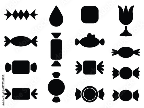 A collection of black candy shapes and wrappers are displayed on a white background.