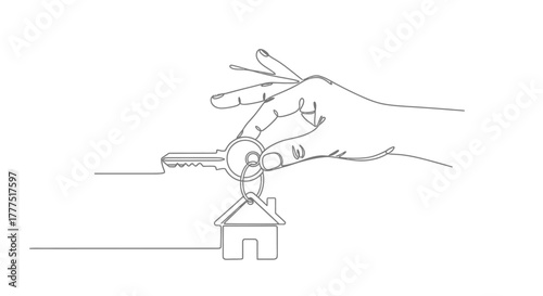 A hand holds a house key on a keychain, symbolizing homeownership.