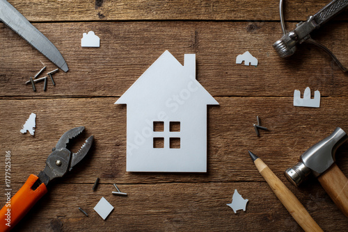 Fototapeta Naklejka Na Ścianę i Meble -  Building a home concept with tools and materials on a rustic wooden background