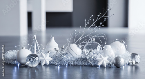 Elegant White and Silver Christmas Ornaments with Twinkling Lights on a Reflective Surface