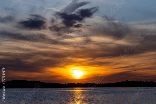 Fototapeta Naklejka Na Ścianę i Meble -  Dramatic summer sunset over Lake Mitkow in Poland. Evening landscape.