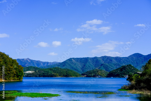 Wallpaper Mural Clear Blue Sky and Reservoir with Mountains, South Korea Torontodigital.ca