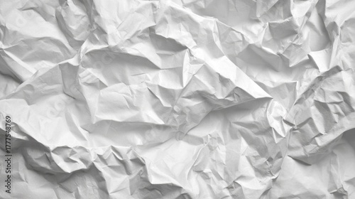 Wallpaper Mural A close-up view of crumpled white paper, showcasing its textured surface and intricate folds, creating a visually interesting backdrop. Torontodigital.ca