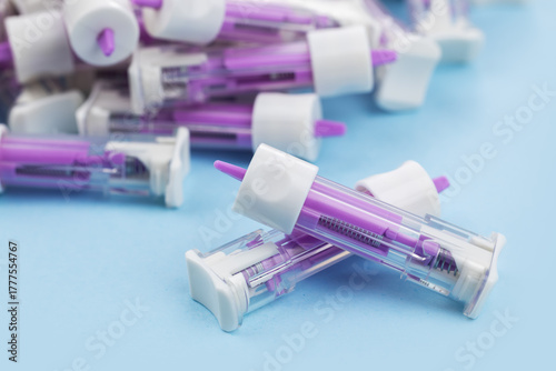 Disposable safety lancets. Automatic lancet scarifier for painless blood sampling. Blood test with a finger. injection of blood