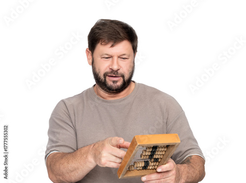 Bearded man holding vintage wooden abacus, looking confused and puzzled. Funny concept of outdated accounting, meme idea of dumb accountant not understanding. Isolated on transparent background.