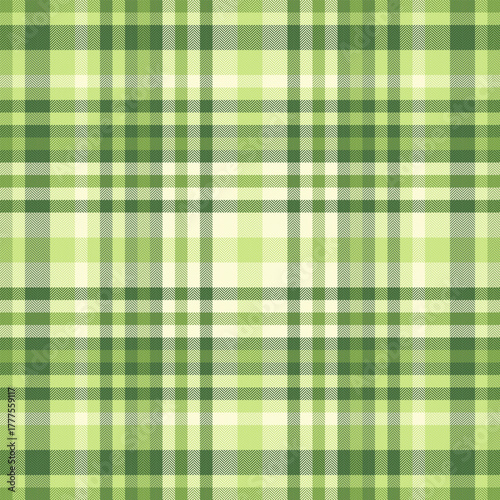 Coloured textile background texture, revival tartan plaid fabric. Girl pattern seamless vector check in green and lime colors.