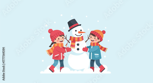 Two happy children building a snowman on a cold, snowy winter day.