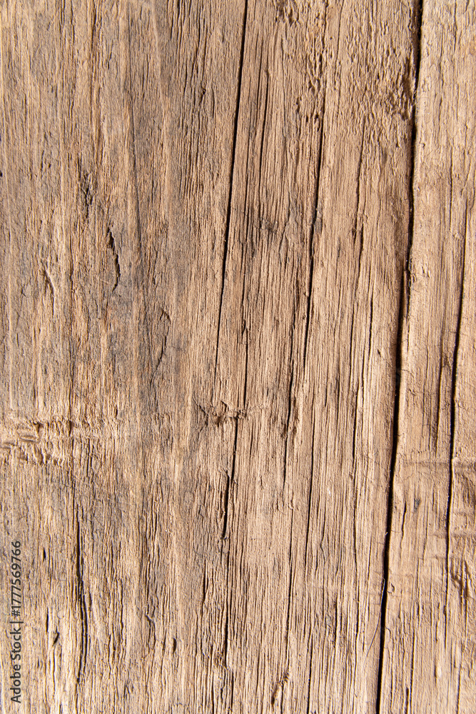 Naklejka premium Fond texturé d'une planche en bois flotté