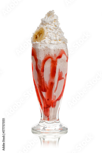 Creamy banana milkshake with fluffy whipped cream and bright strawberry syrup on an isolated white background