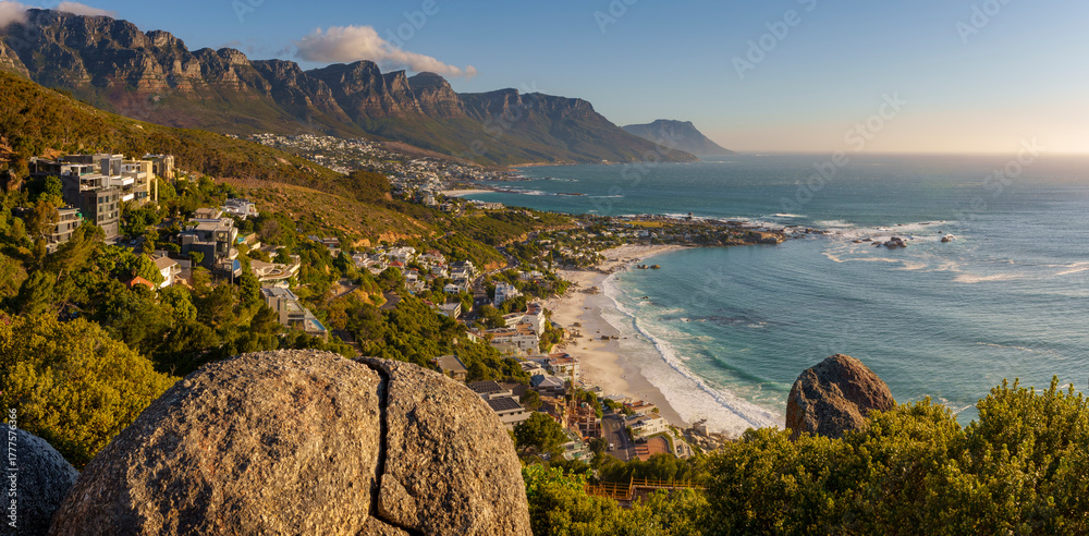 Fototapeta premium View of the corner of Table Mountain, the Twelve Apostles, Clifton Beach and Camps Bay., part of the Atlantic SeaboardCape Town. Western Cape. South Africa.