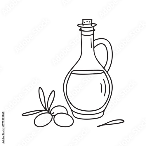 Glass bottle of olive oil displayed next to a cluster of green olives