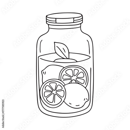 Glass jar stocked with preserved lemons fully immersed in brine