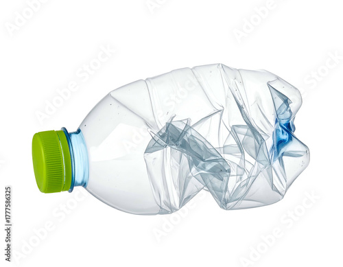 A crumpled plastic bottle with a green cap lies on a black background