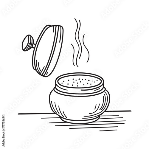 Open spice tin holding a strong and aromatic mixture