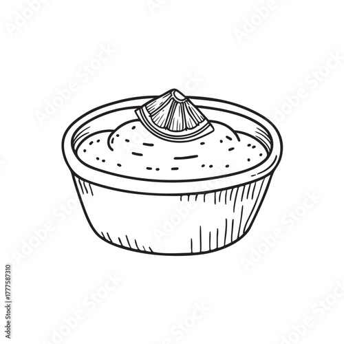 Small dip bowl containing a mixture of lemon garlic and cumin