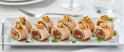 bite-sized chicken appetizer with figs and nuts
