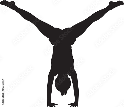 Silhouette of a female gymnast performing a handstand with legs spread wide in aV-shape on a white background