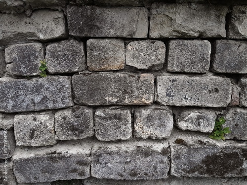 Background of very old stone wall texture photo