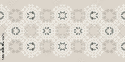 Elegant Christmas seamless vector snowflake pattern on beige background. Beautiful seasonal pattern for wrapping paper, greeting cards, invitations, gift boxes and home decor.