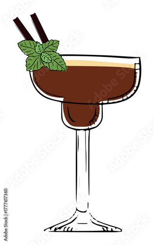 Stylish cocktail glass filled with a rich beverage, adorned with fresh mint and chocolate sticks.